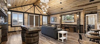 Serenity found in this large, lodge-style 4-bedroom house surrounded by nature