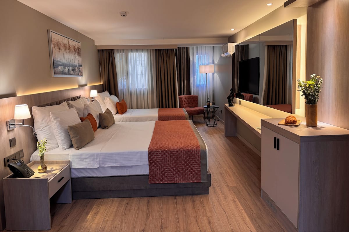 Family Room | In-room safe, blackout drapes, iron/ironing board, free WiFi