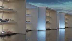 A modern hotel with multiple floors, each with a balcony and a view of the water. - Beautiful New Luxury Apartment - Cora Sunset at Campestre (San Jose Del Cabo)
