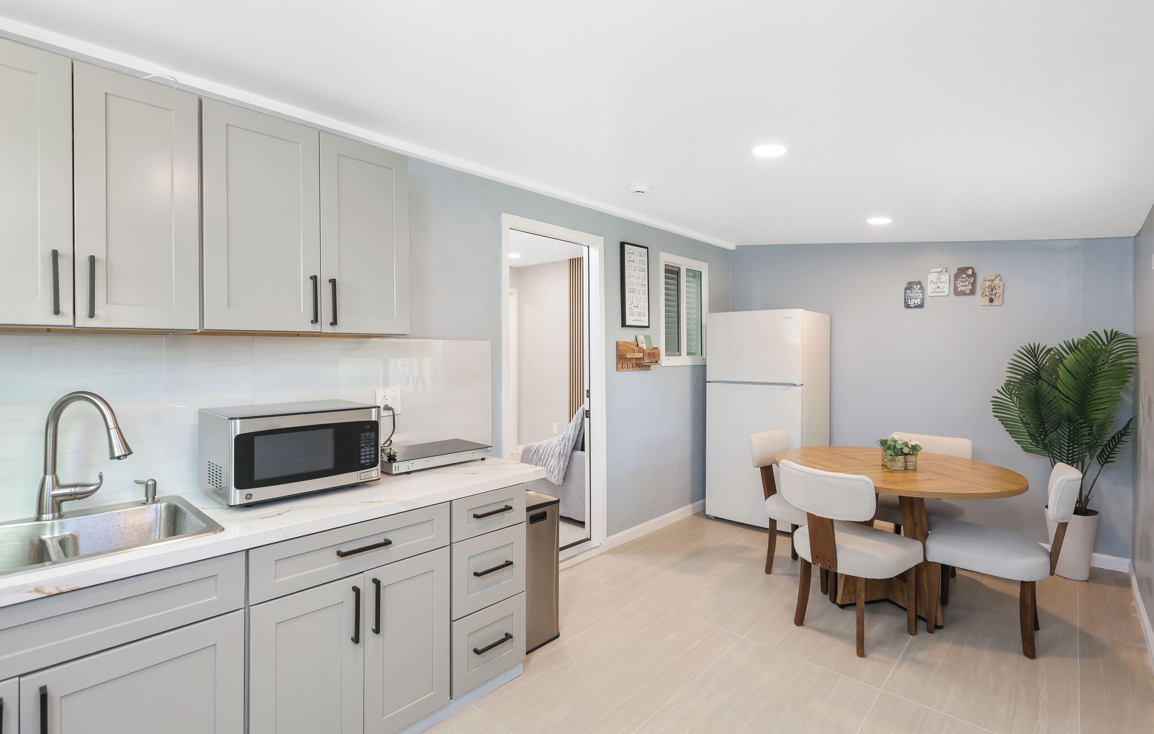 Fridge, microwave, stovetop, coffee/tea maker