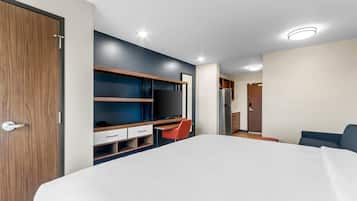 Suite, 1 King Bed, Non Smoking | Pillowtop beds, desk, laptop workspace, iron/ironing board