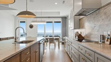 Coffee/tea maker, fridge, microwave, oven