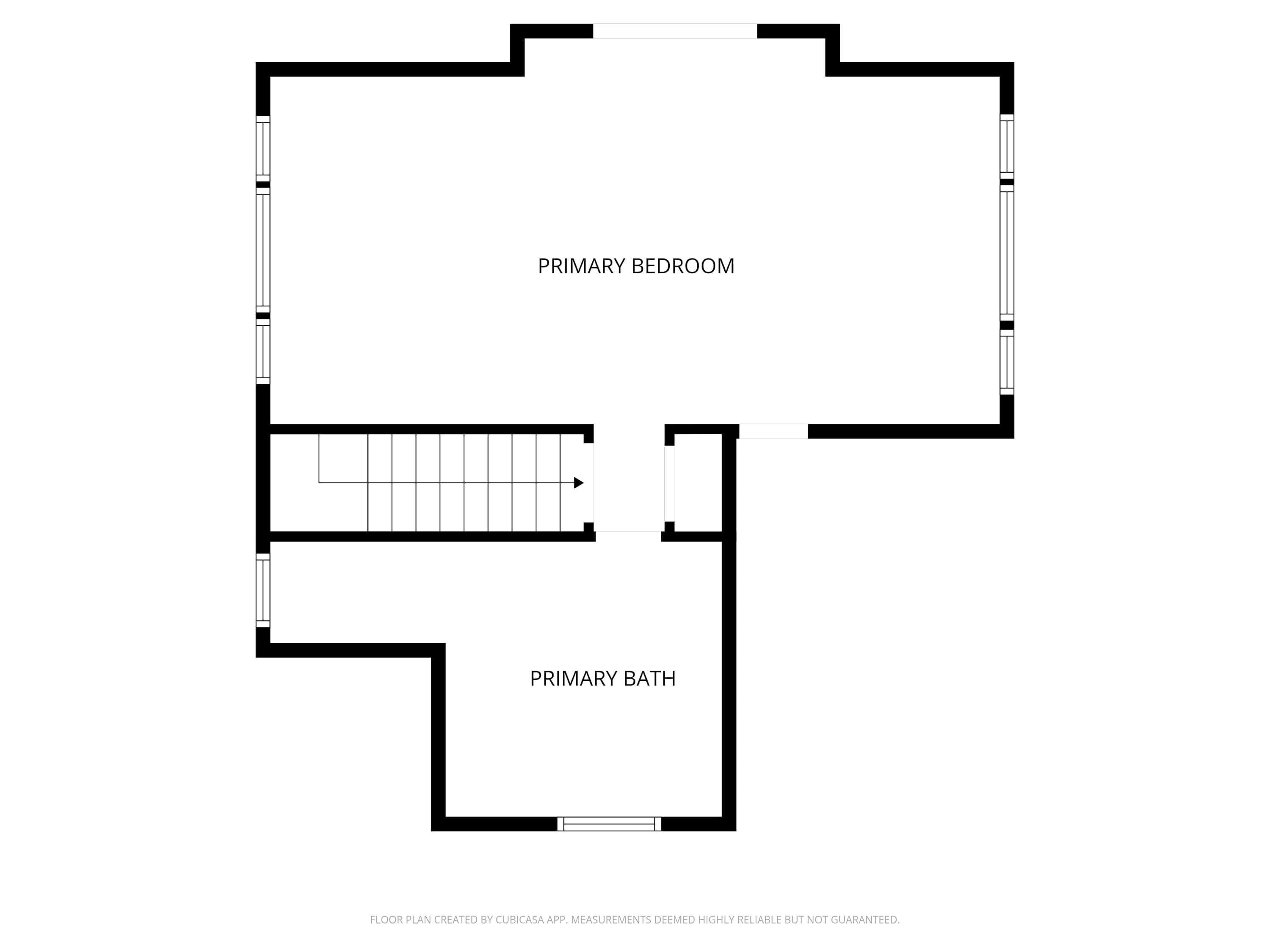Un plan d’étage comprenant une chambre principale et une salle de bain principale.