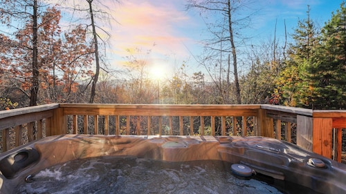 Hot Tub, Game Loft, Open Living, Minutes to Downtown Gatlinburg Whisper Cabin by Avantstay