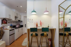 Fridge, stovetop, electric kettle, cookware/dishes/utensils - 
Unique Chiq/comfy place with board games! EDSA, QC (Quezon City)