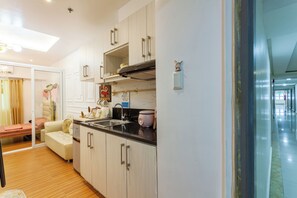 Fridge, stovetop, electric kettle, cookware/dishes/utensils - 
Unique Chiq/comfy place with board games! EDSA, QC (Quezon City)