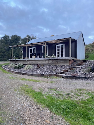 Off Grid 2-bedroom cabin in Onaero perfect for relaxing getaways