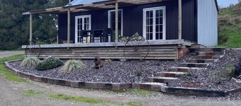 Off Grid 2-bedroom cabin in Onaero perfect for relaxing getaways