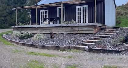 Off Grid 2-bedroom cabin in Onaero perfect for relaxing getaways
