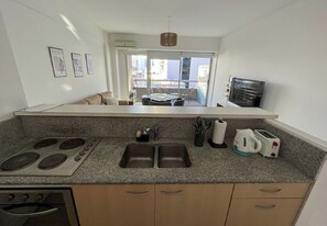 Apartment, Balcony, City View | Private kitchen - RentUp - Dpto con balcón y piscina (Buenos Aires)