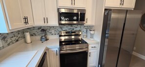 Microwave, oven, stovetop, dishwasher - Lux Modern 3BR/2BA Duplex • Brand New &  Furnished (Brownsville)