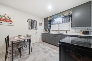 Fridge, microwave, oven, stovetop - Quiet pet-friendly escape near airport with doggie door and privacy fence. (Wichita)