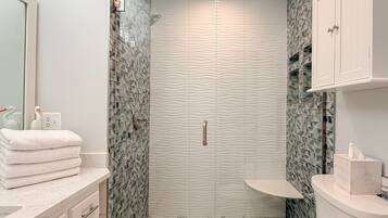 Shower, hair dryer, towels
