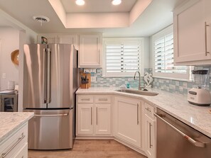 Fridge, microwave, oven, stovetop - Updated 3BR Beach House • 3 Blocks to Ocean • Fenced Yard • Grill (North Myrtle Beach)