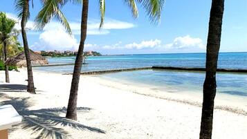 Beach nearby, beach umbrellas, beach towels