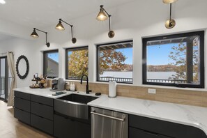 Fridge, microwave, oven, stovetop - New Lakefront Home with Private Dock, Game Room & Firepit at 9MM (Lake Ozark)