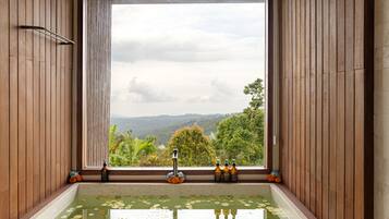 One Bedroom Luxury Serenity Cabin | Bathroom | Separate tub and shower, towels, soap, shampoo