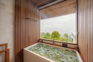 One Bedroom Luxury Panoramic Cabin | Bathroom | Separate tub and shower, towels, soap, shampoo