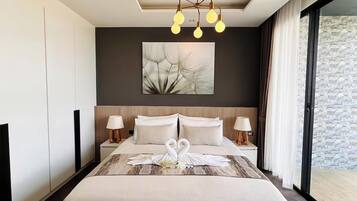 Luxury Villa, Pool View | Desk, laptop workspace, blackout drapes, soundproofing