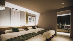 A hotel room with two beds, a large window, and artwork on the wall. - R Residence Tengachaya IV (Osaka)