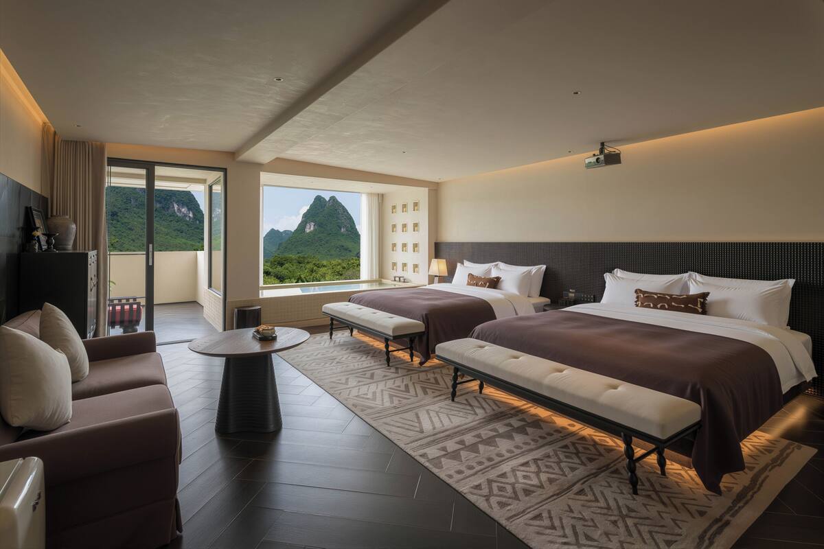 Premium bedding, memory-foam beds, free minibar, desk