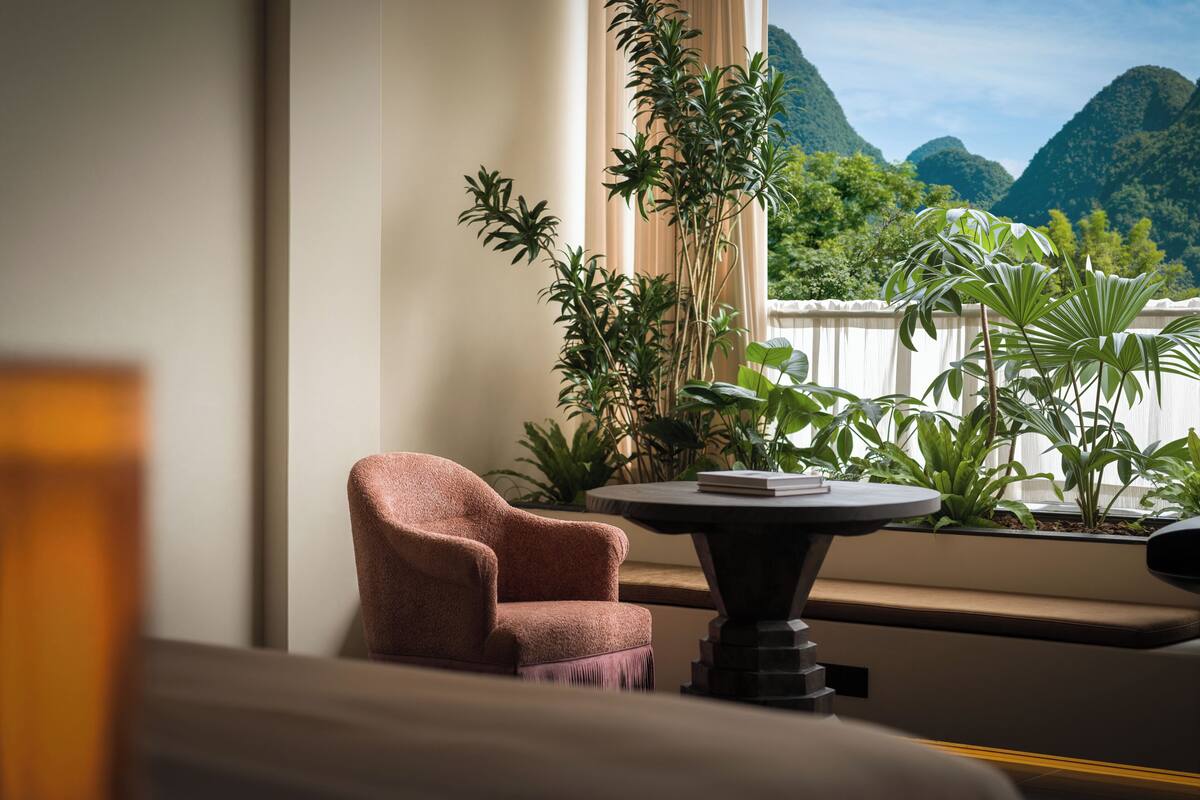 Premium bedding, memory-foam beds, free minibar, desk