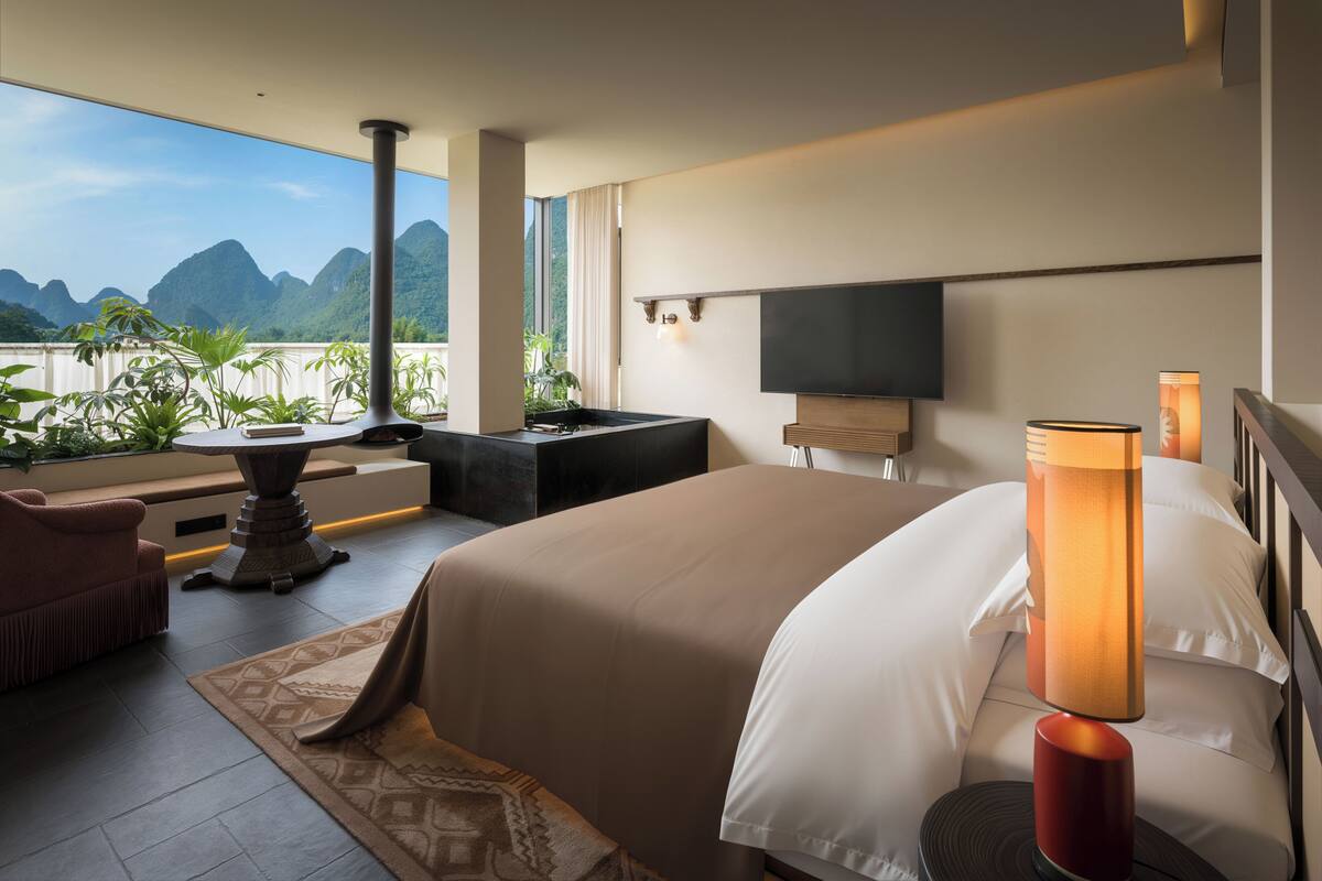 Premium bedding, memory-foam beds, free minibar, desk