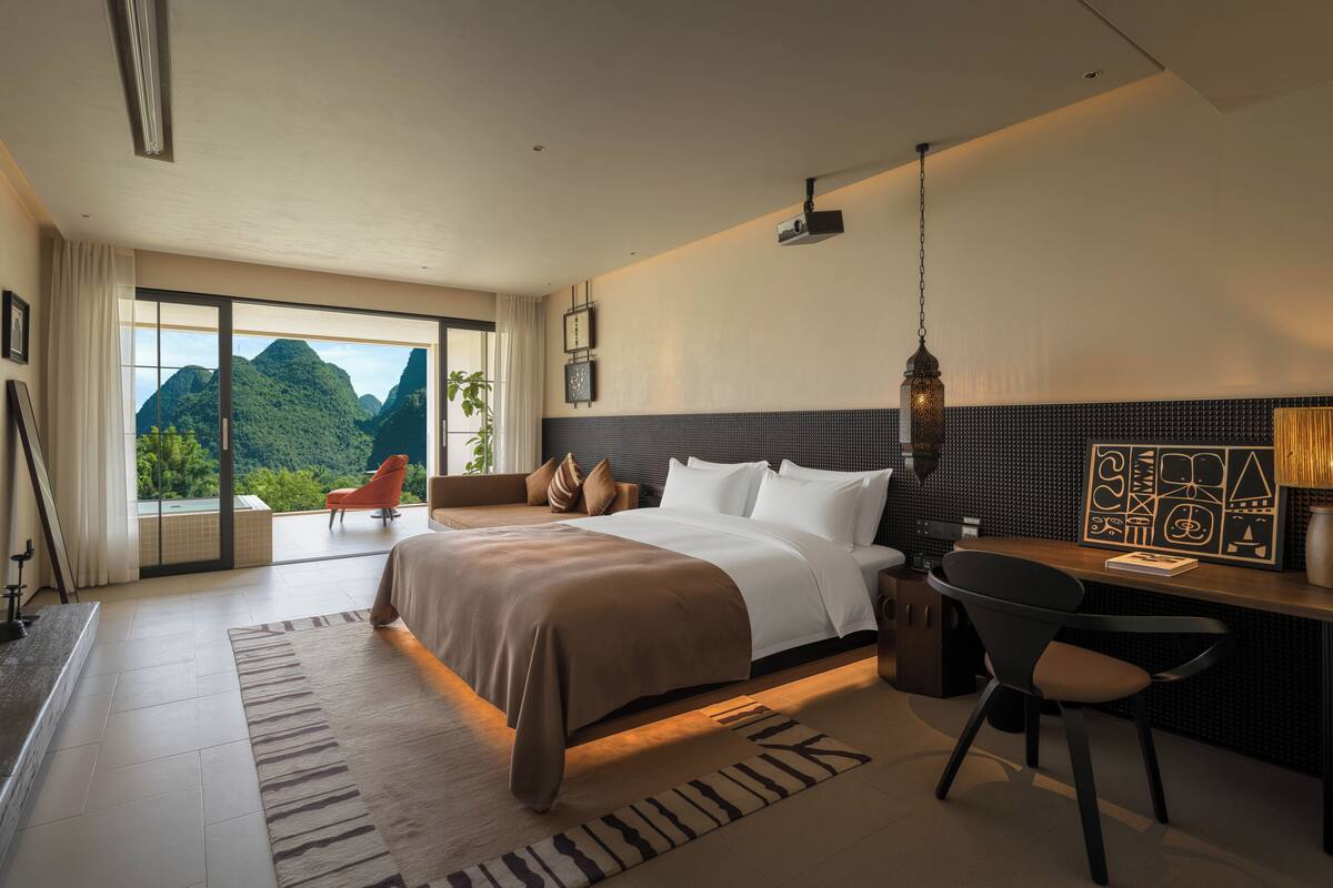 Premium bedding, memory-foam beds, free minibar, desk