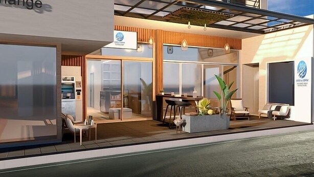 Un edificio moderno con facciata in vetro, una sala da pranzo con tavolo e sedie, e un’area relax con una pianta.