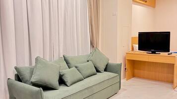 Family Studio, Garden View | In-room safe, free WiFi