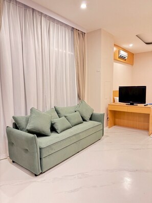 Estúdio família, vista para o jardim | Cofres nos quartos, Wi-Fi de cortesia