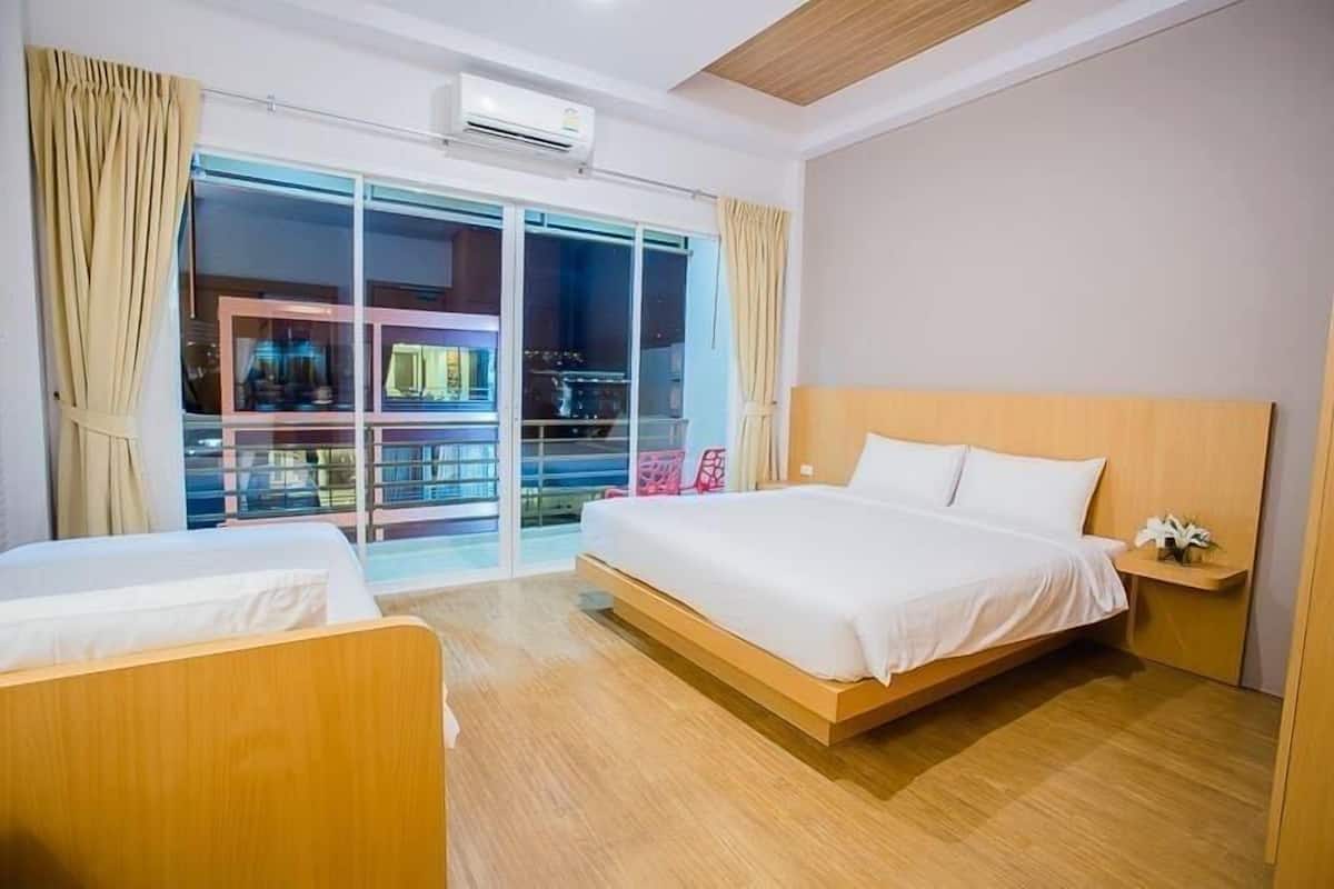 Deluxe Triple Room, Balcony, City View | In-room safe, free WiFi