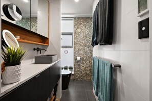 Hair dryer, towels, shampoo, toilet paper