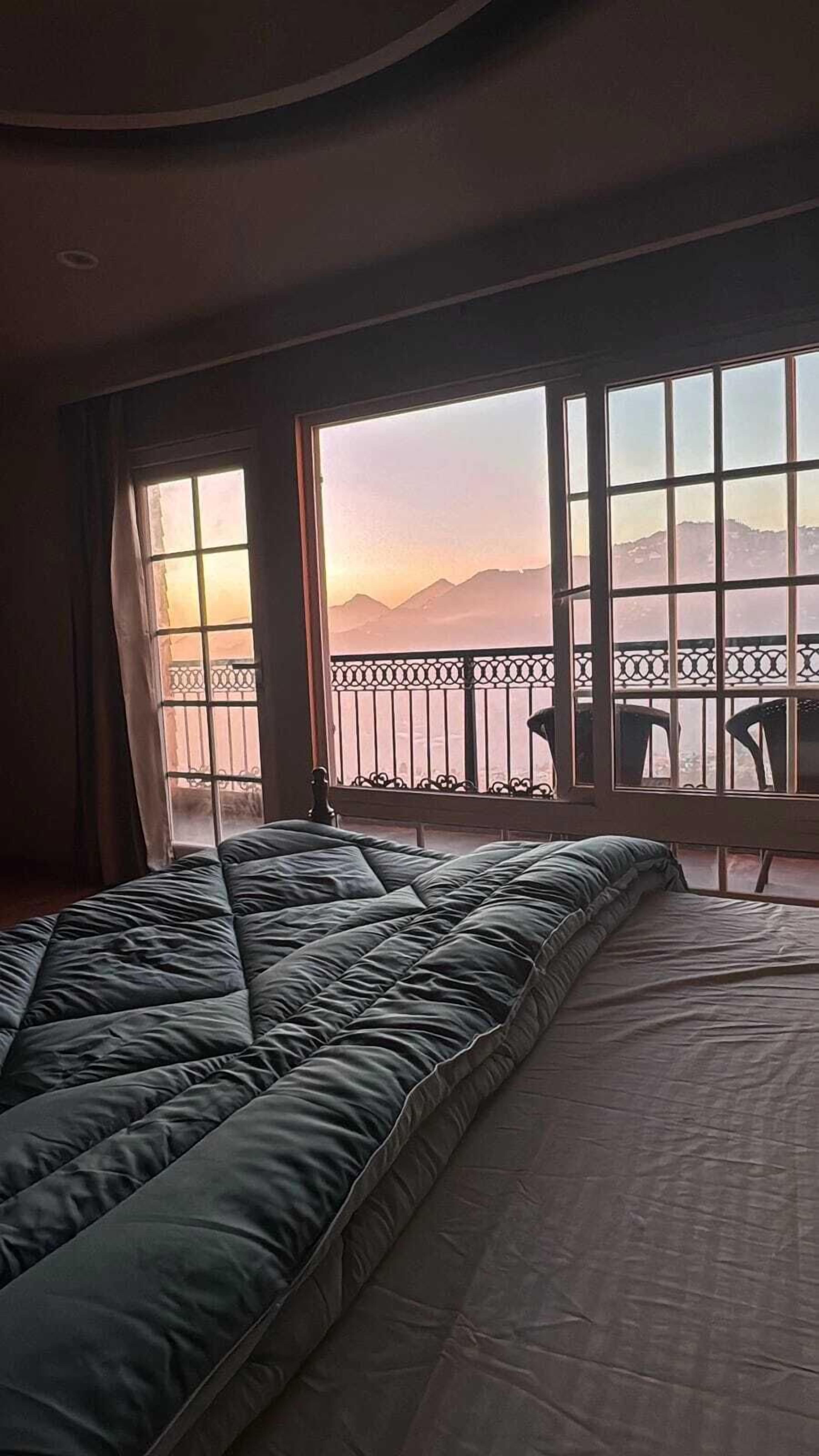 Premium bedding, memory-foam beds, in-room safe, laptop workspace