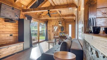 Standard Chalet, Multiple Bedrooms (Wood House Bela Krajina) | Living area | 21-inch Smart TV with digital channels, fireplace