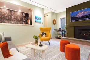 Smart TV, fireplace, books