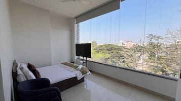 Habitación Deluxe | Baño | Regadera, amenidades de baño gratuitas, toallas, jabón