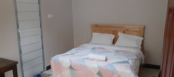 Beautiful 7-bedroom apartment with AC in pleasant Karatu