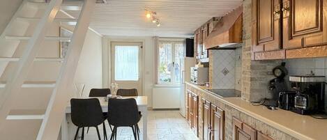 Fridge, microwave, stovetop, coffee/tea maker