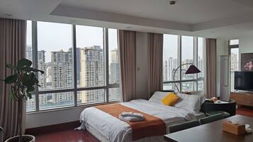 Superior Condo, City View | Blackout drapes, iron/ironing board, free WiFi