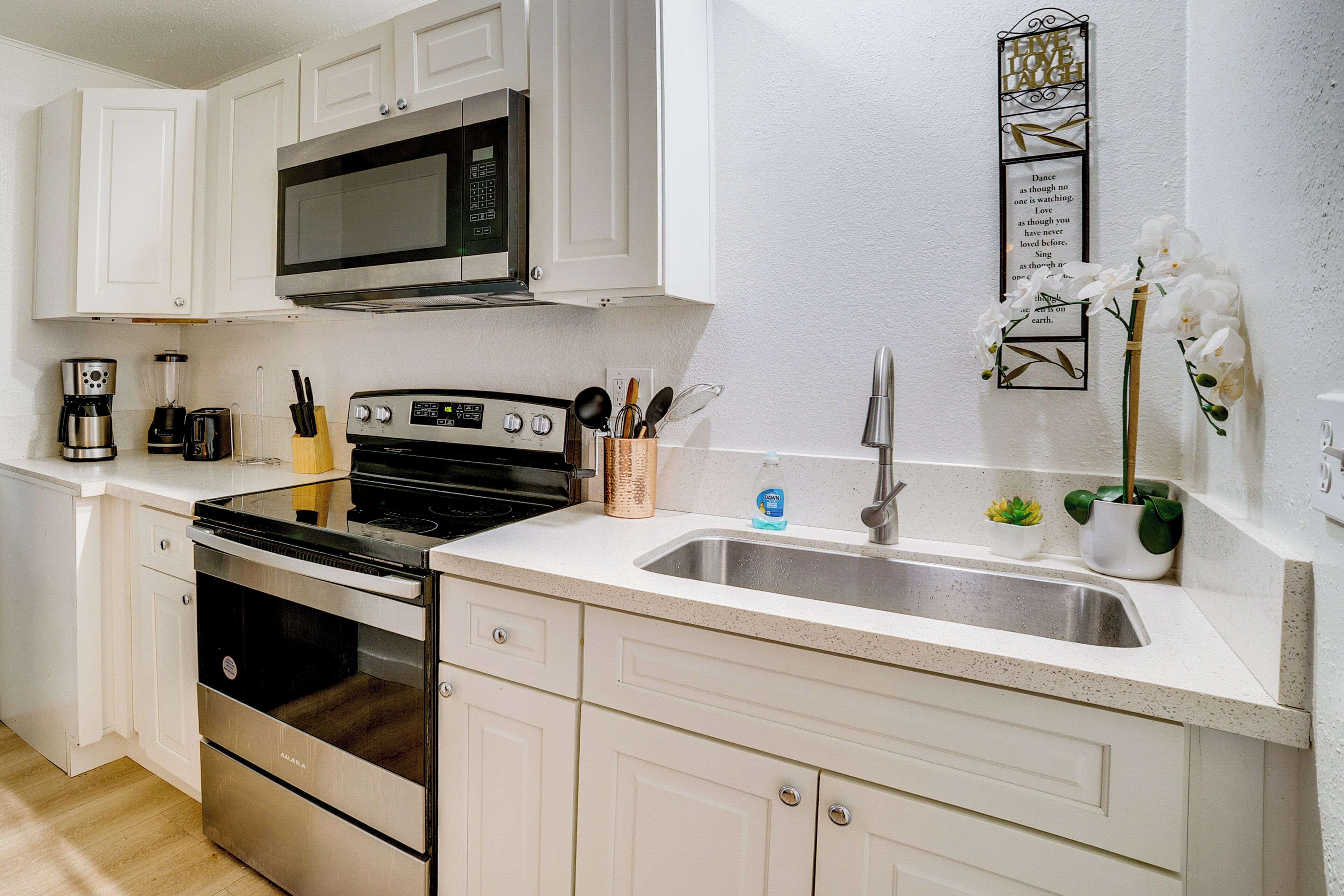 Fridge, microwave, stovetop, coffee/tea maker