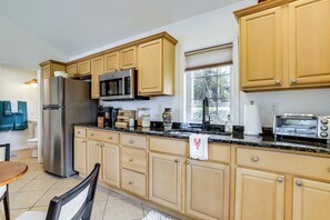 Fridge, microwave, coffee/tea maker, toaster