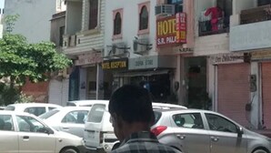 A multi-story building with a sign for 'Hotel Deepak Residency' and 'Hotel S.R. Palace'. - Hotel Deepak Residency (Jaipur)