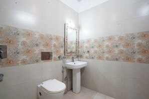 Double Room, City View | Bathroom | Shower, free toiletries, towels, toilet paper