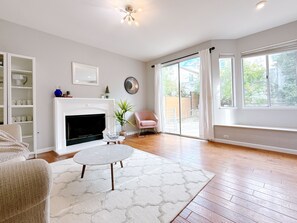 Smart TV, fireplace, table football, books