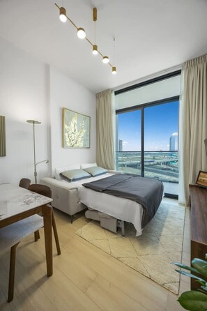Iron/ironing board, WiFi, bed sheets - Modern JVC Apt with Pool & Gym (Dubai)