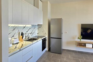 Family Apartment, Multiple Bedrooms, Mountainside (Hill Apartment with Sea View in) | Private kitchen | Fridge, oven, stovetop, coffee/tea maker - Hill Apartment With Sea View in Durres (Durrës)