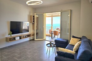 Family Apartment, Multiple Bedrooms, Mountainside (Hill Apartment with Sea View in) | Living area | 21-inch Smart TV with cable channels - Hill Apartment With Sea View in Durres (Durrës)