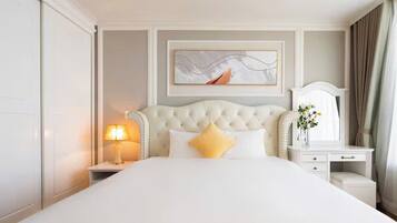 Premium bedding, down duvets, Select Comfort beds, free minibar