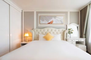 Premium bedding, down duvets, Select Comfort beds, free minibar